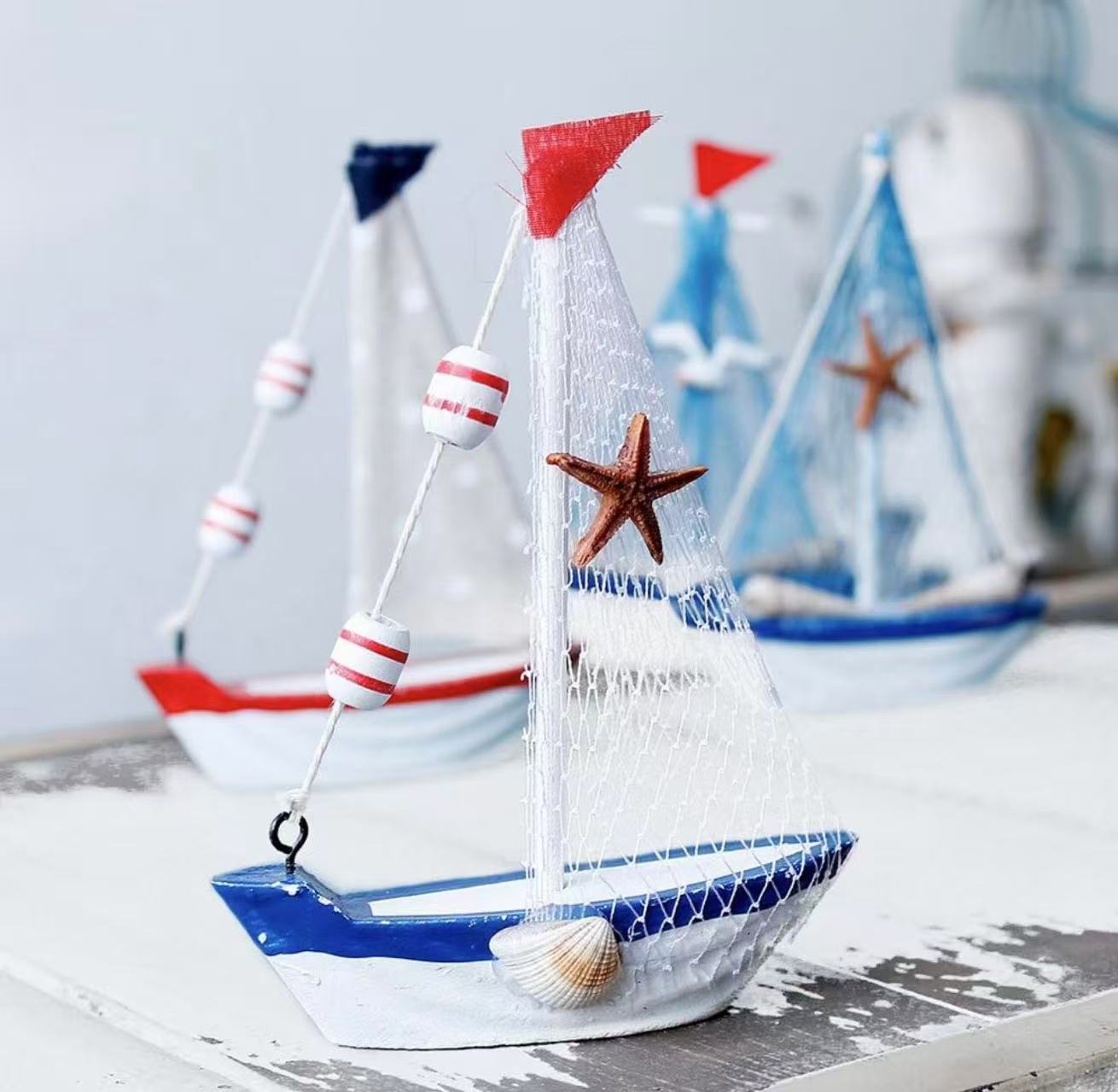 Wooden Sailboat Model Set of 4–4.3"H with Fish Net, Starfish, and Seashell Accents. White Beach Nautical Theme Decor.