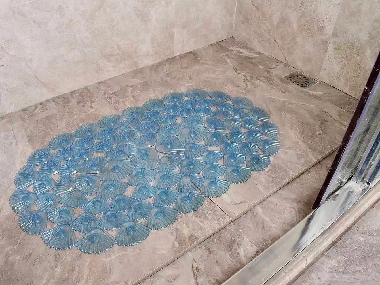 Non-slip Bathtub Mat: 27" x 15", designed for smooth, non-textured tubs. Machine Washable: Oval shape with suction cups for a secure fit in the bathtub or shower stall.